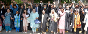 PU teachers protest Indian atrocities in Held Kashmir
